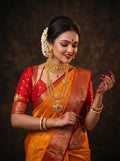 Mustard Yellow Crepe Georgette Saree with Rich Red Banarasi Zari Border & Grand Woven Pallu