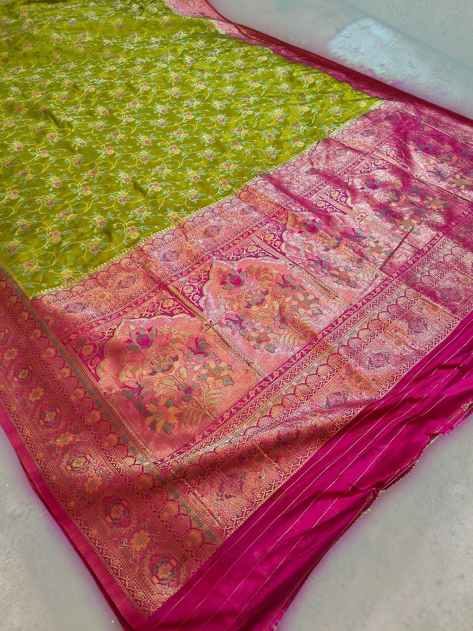Parrot Green Banarasi semi Katan Silk Saree with Meenakari Floral Jaal & Rani Pink Woven Border and Rich Pallu