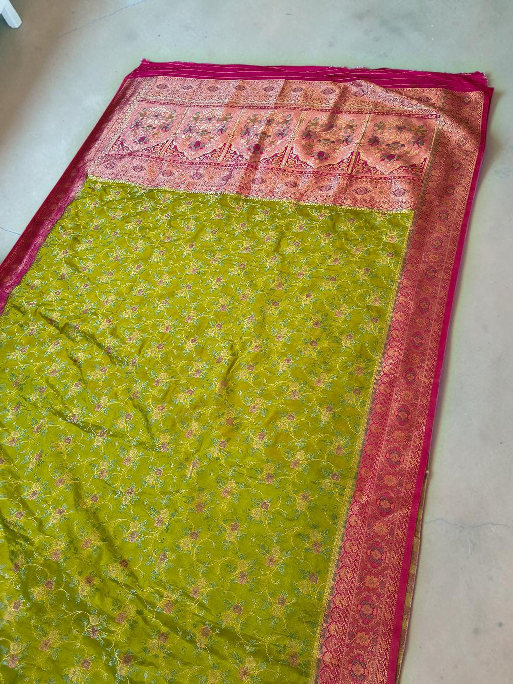 Parrot Green Banarasi semi Katan Silk Saree with Meenakari Floral Jaal & Rani Pink Woven Border and Rich Pallu