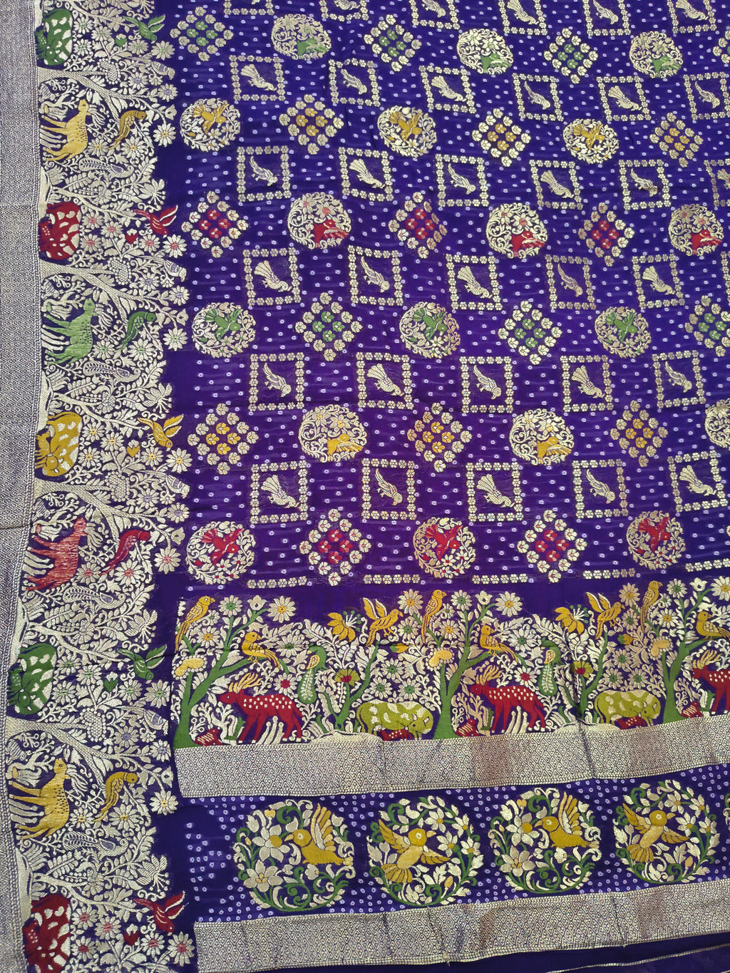 Regal Purple Khaddi Georgette Saree with Multicolor Floral & Zari Border