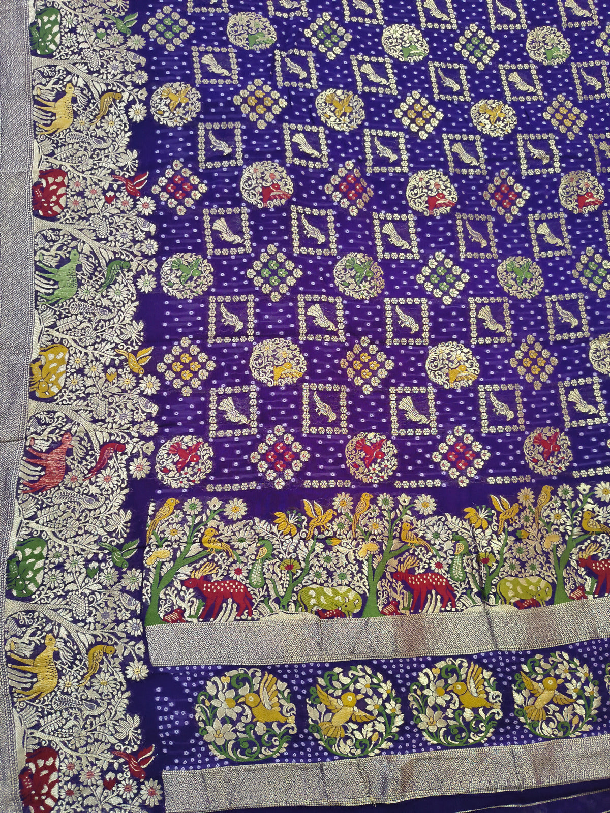 Regal Purple Khaddi Georgette Saree with Multicolor Floral & Zari Border