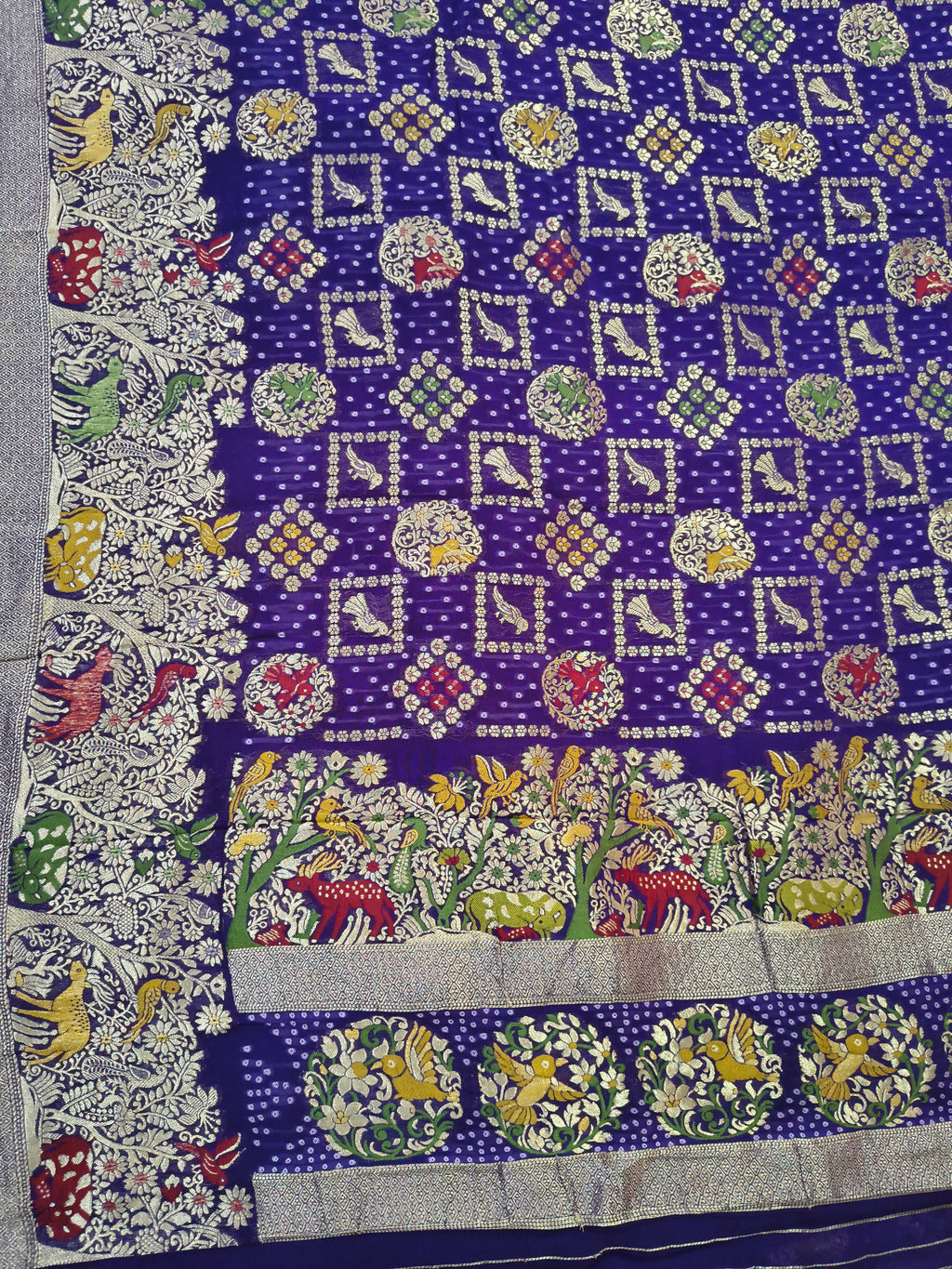 Regal Purple Khaddi Georgette Saree with Multicolor Floral & Zari Border