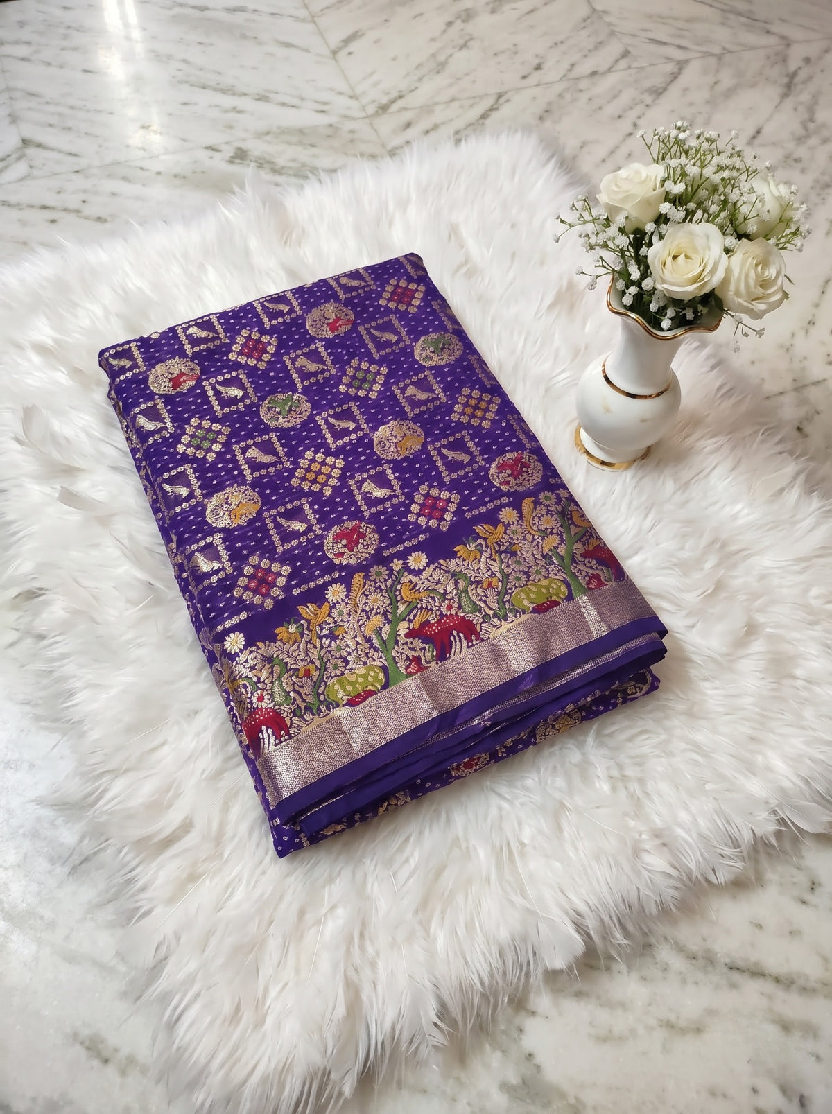 Regal Purple Khaddi Georgette Saree with Multicolor Floral & Zari Border