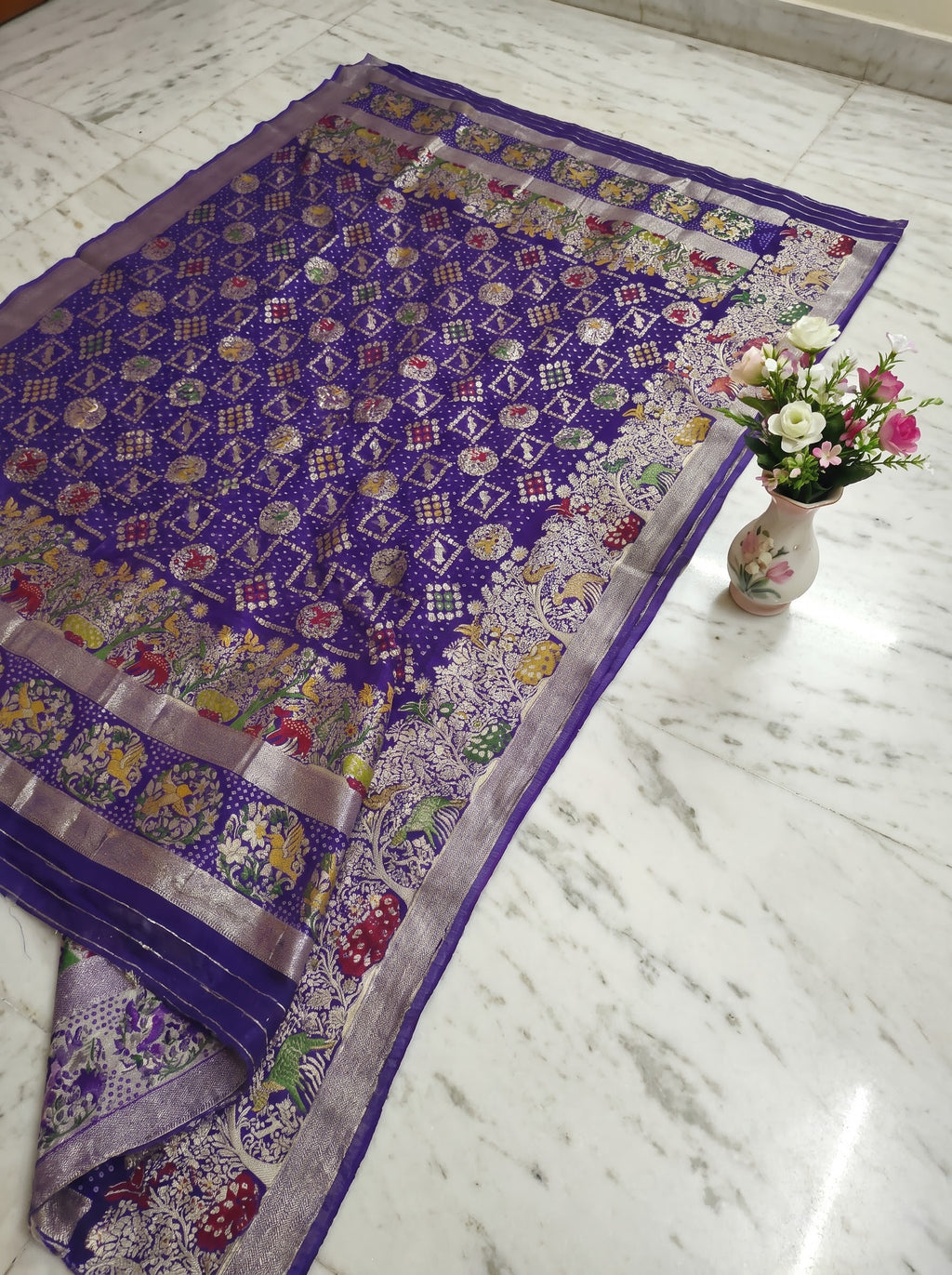 Regal Purple Khaddi Georgette Saree with Multicolor Floral & Zari Border