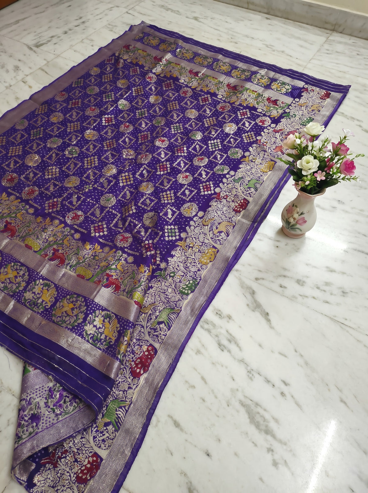 Regal Purple Khaddi Georgette Saree with Multicolor Floral & Zari Border