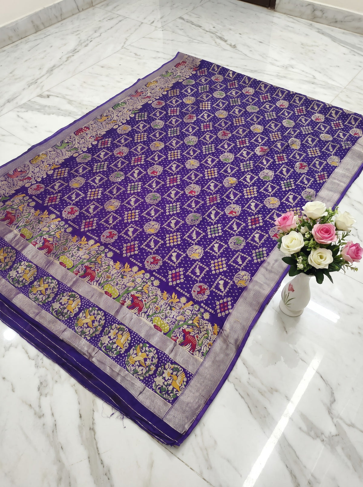Regal Purple Khaddi Georgette Saree with Multicolor Floral & Zari Border