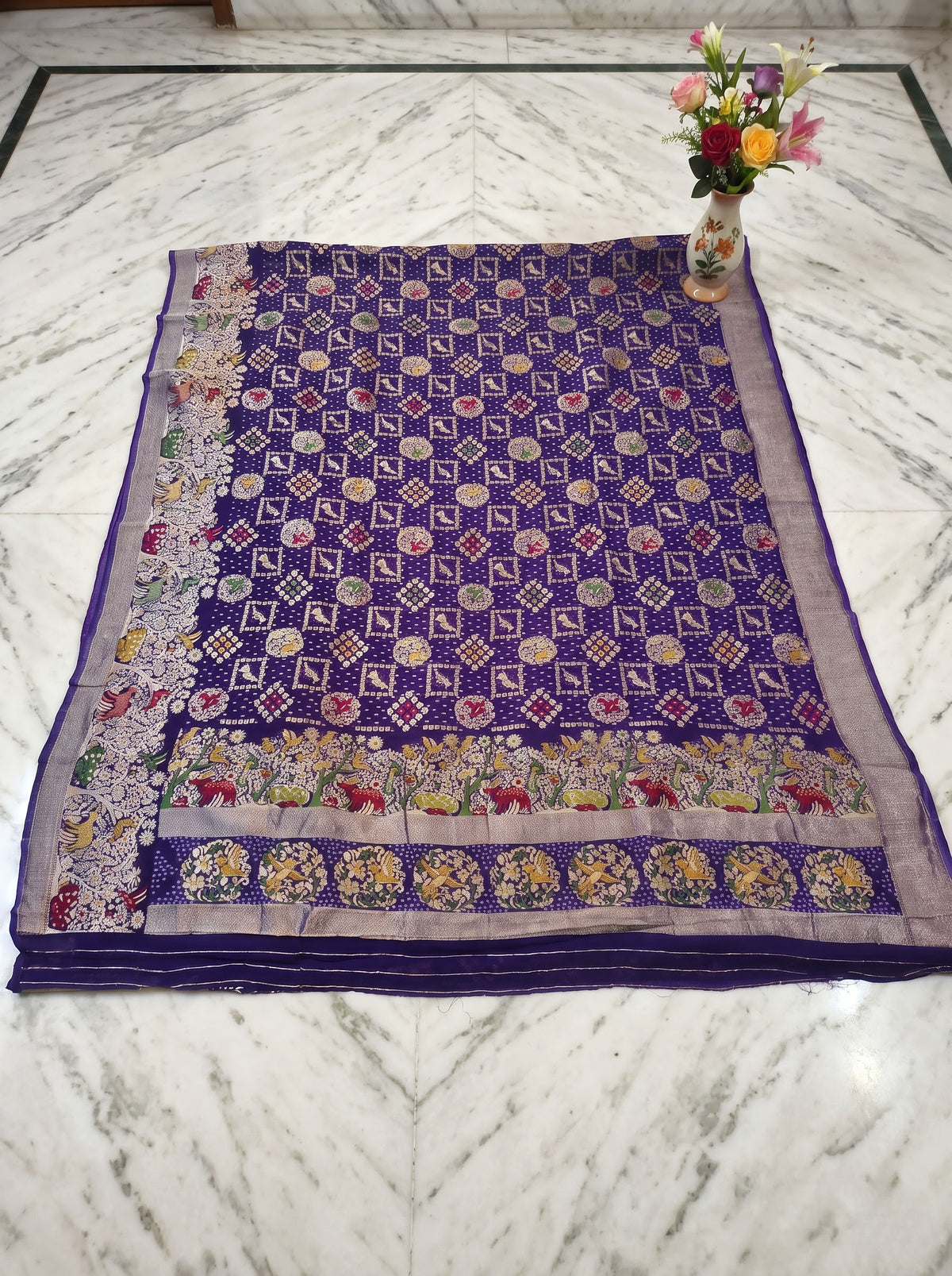 Regal Purple Khaddi Georgette Saree with Multicolor Floral & Zari Border